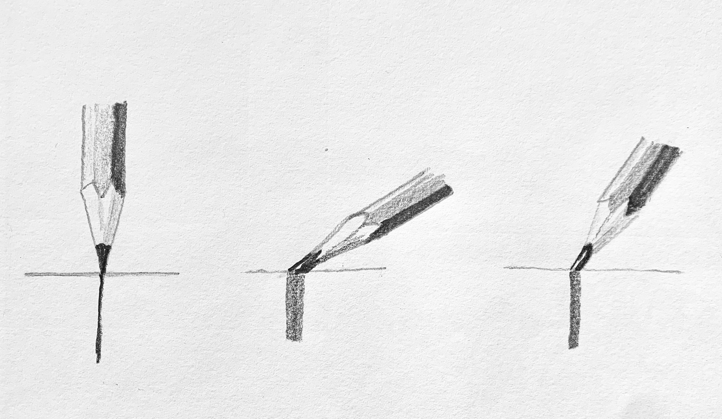 Filing your pencils at an angle to achieve broad stroke marks.